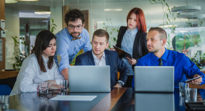 R Cube Dev developers working in the studio